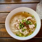 Bowl of pork noodle soup photographed in Phuket, Thailand